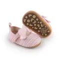 Detail von rosa Tweed-Prinzessinnenschuhen für Babys mit weicher Plüschschleife und Sohle - Innenlänge 11cm / Rosa