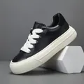 Baskets à plateforme tendance en cuir noir véritable pour hommes avec lacets blancs épais - 38 / Noir