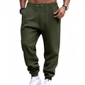 Detailed view of men's olive green sweatpants with drawstring waist and ribbed cuffs. - Army Green
