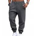 Detail view of men's charcoal gray French Terry joggers with an elastic drawstring waist - Dark Gray