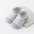 Breathable grey and white knitted baby walking shoes featuring soft non-slip rubber soles - 11.5 / Gray