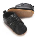 Dettaglio scarpe primi passi per neonati in stile britannico con suola in gomma - Nero