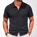 Men's black textured knit short sleeve polo shirt featuring refined jacquard pattern - M / Tops / Black