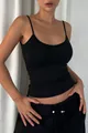Detail view of a minimalist black spaghetti strap tank top for a sexy, chic summer look. - S / Tops / Black