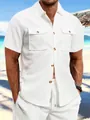 Detail van een wit herenwafelgebreid cargoshirt met dubbele borstzakken voor de zomer - S / Wit