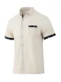 Close-up of men's casual shirt featuring waffle texture and patterned trim details. - Khaki
