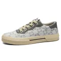Baskets décontractées en toile pour hommes avec imprimé gris et semelle beige stylée - Gris