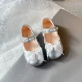 Elegant silver Mary Jane shoes for girls featuring a delicate lace bow and pearl strap - Size 23 (Inner Length 14.3cm) / Silver