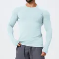 Slim-fit men's light blue seamless long-sleeve athletic shirt for fitness training - S / Tops / Turquoise