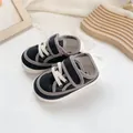 Klassische schwarze Segeltuchschuhe für Kleinkinder mit weicher Sohle für Jungen und Mädchen - Größe 13.0 Innenlänge 13cm / Schwarz