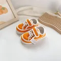 Bright orange children's canvas sneakers with white velcro straps and soft soles - Orange