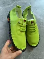 Detailed view of lime green hand-stitched casual women's flats with comfortable soft sole - 35 / Fluorescent Green