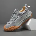 Baskets de sport décontractées en cuir gris pour hommes avec une semelle en gomme - 38 / Gris clair