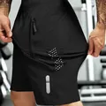 Schwarze, hochelastische, schnelltrocknende Herren-Sporthose mit Reißverschlusstasche. - S / Unterteile / Schwarz