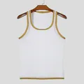 Detailed macro shot of white mesh fabric on a breathable men's fitness tank top with gold trim. - S / Tops / White