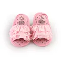 Detailed view of pink ruffled baby prewalker sandals with polka dot insoles - 11cm / Pink