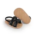 Close-up of black ruffled baby girl sandals with flexible prewalker sole for infants - Inner Length 11cm/48g / Black