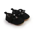 Detailed view of black baby girl lace bow walking shoes with soft soles and flowers - Insole Length 11cm / Black