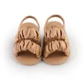 Detailed view of ruffled cloud-style tan baby sandals with soft soles and elastic straps - 11cm / Apricot