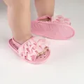 Detailed view of pink ruffled baby prewalker sandals featuring a soft elastic back strap - 11cm (2258) / Pink