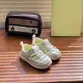 Detail shot of cream baby sandals with breathable mesh and sturdy Velcro straps on a wooden surface - Size 22 (Insole 14.5cm, Fit Foot Length 13.5-14cm) / Beige