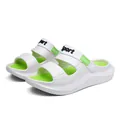 Close-up of white and neon green outdoor sandals featuring 'Sport' text on the straps - White Green