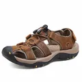 Durable men's leather outdoor sandals with closed-toe design for hiking and beach wear - 38 / Dark Brown