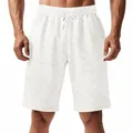 Detailed view of white men's shorts with textured checkered pattern and drawstring - White
