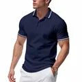 Detail view of navy blue quick-dry polo shirt with white striped collar and cuffs. - S / Tops / Navy Blue