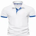 Close-up detail of white men's polo shirt featuring elegant blue collar trim and cuffs - White