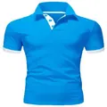 Front detail of a bright blue men's short sleeve polo shirt with white trim accents - XXS / Top (PO-2025) / Sapphire Blue