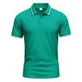Front view of a green quick-dry polo shirt with white striped collar and sleeve cuffs. - Green