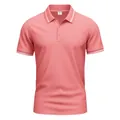 Detailed view of salmon pink Polo shirt featuring white striped collar and sleeve cuffs. - Rose Red
