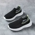 Zapatillas deportivas sin cordones de punto negro para niños con suela blanca ondulada - Negro