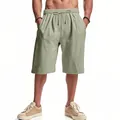 Vista completa dei pantaloncini larghi in lino da uomo con coulisse verde salvia - Verde chiaro