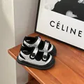 Close-up of silver quilted baby boy sandals with soft soles and velcro straps - Size 16 / Internal Length 12.5cm / Silver