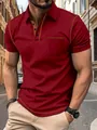 Dettaglio di una polo bordeaux con cuciture a contrasto e taschino sul petto. - Taglia S / Top / Borgogna