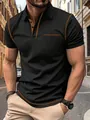 Primo piano di polo nera da uomo con cuciture a contrasto arancioni e taschino frontale - Taglia S / Top / Nero