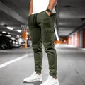 Slim fit men's olive green cargo joggers with elastic cuffs and pocket detail for sports. - Army Green