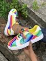Vibrant rainbow gradient women's sneakers with colorful laces and durable white rubber sole. - 36 / Rainbow
