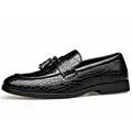 Elegant black men's loafers featuring embossed crocodile texture and classic tassel detail - Black