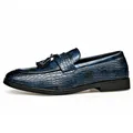 Elegant men's navy blue loafers featuring crocodile pattern texture and tassel detail - Blue