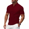 Close-up of burgundy men's short sleeve polo shirt with ribbed texture and lapel. - Burgundy