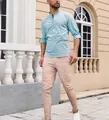 Elegantes hellblaues Baumwoll-Henley-Hemd für Herren mit Stehkragen und langen Ärmeln. - Hellblau