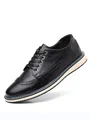 Klassische schwarze Brogue-Lederschuhe für Herren mit stylischer weißer Sohle und Schnürung - 40 / Schwarz