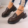 Vintage dark brown platform loafers for women featuring thick soles and a classic British style - 35 / Brown
