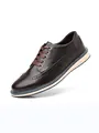 Elegante braune Leder-Brogue-Schuhe für Herren mit Flügelkappendesign und weißer Sohle. - 40 / Dunkelbraun