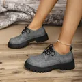 Vintage grey fabric Oxford shoes with chunky black platform lug soles shown on feet - 35 / Gray