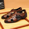 Men's brown leather closed-toe woven sandals with an adjustable buckle strap - Brown