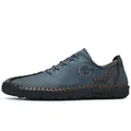Herren Slipper aus blau-grauem Leder mit handgefertigten Nähten und Schnürung - 38 / Blau
